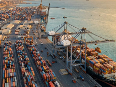 Container ship being unloaded at Jeddah Islamic Port, Saudi Arabia